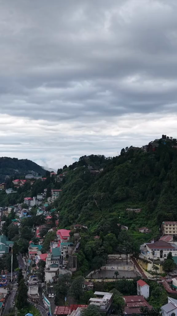 Vertical Aerial View of Mussoorie Amid Monsoon Clouds, Uttarakhand, India