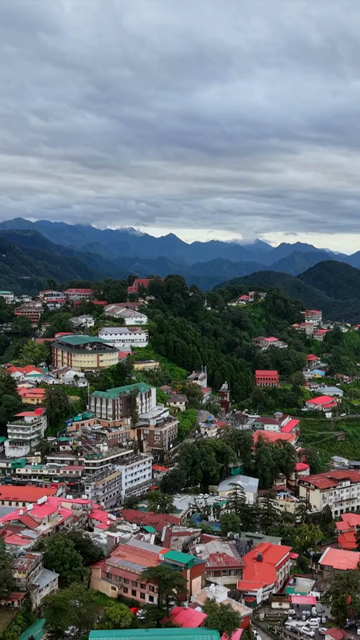 Vertical Aerial View of Mussoorie Amid Monsoon Clouds, Uttarakhand, India