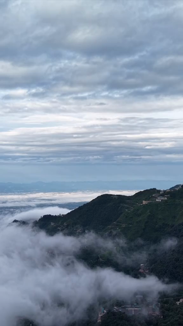 Vertical Aerial View of Mussoorie Amid Monsoon Clouds, Uttarakhand, India