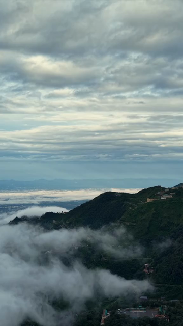 Vertical Aerial View of Mussoorie Amid Monsoon Clouds, Uttarakhand, India