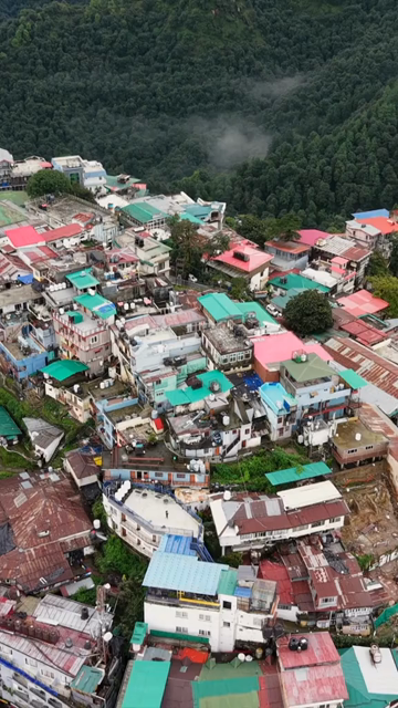 Vertical Aerial View of Mussoorie Amid Monsoon Clouds, Uttarakhand, India