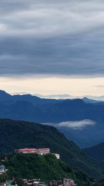 Vertical Aerial View of Mussoorie Amid Monsoon Clouds, Uttarakhand, India