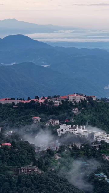 Vertical Aerial View of Mussoorie Amid Monsoon Clouds, Uttarakhand, India