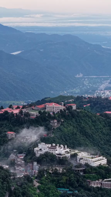 Vertical Aerial View of Mussoorie Amid Monsoon Clouds, Uttarakhand, India