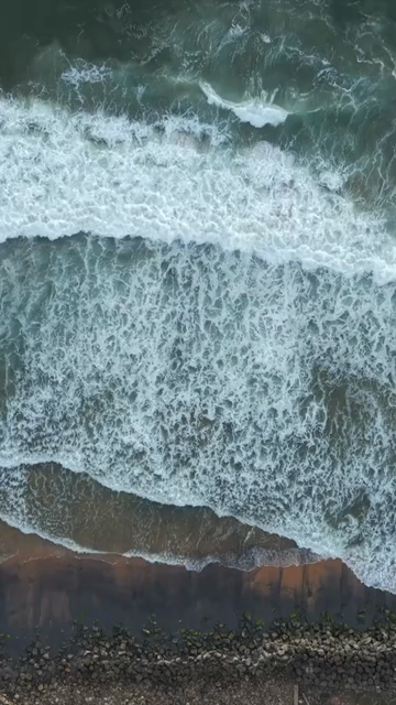 Vertical Aerial View of Ocean Waves Kerala India