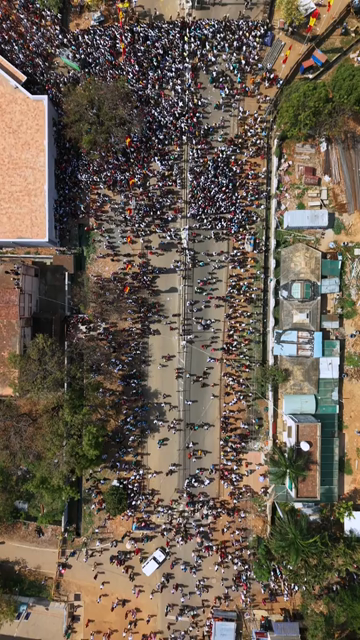 Vertical Aerial View of TVK Political Rally Crowd in Tamil Nadu India