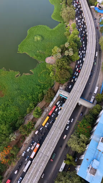 Vertical Aerial View of Powai Lake and Mumbai Skyline India