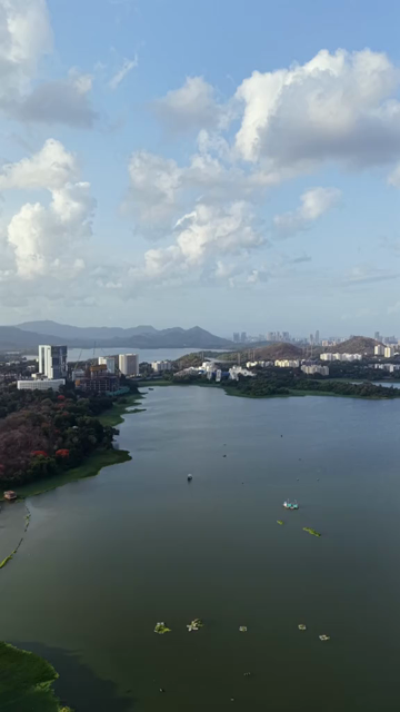 Vertical Aerial View of Powai Lake and Mumbai Skyline India