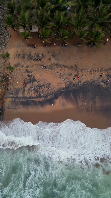 Vertical Aerial View of RK Beach Coastline and Bay of Bengal Waves in Visakhapatnam India