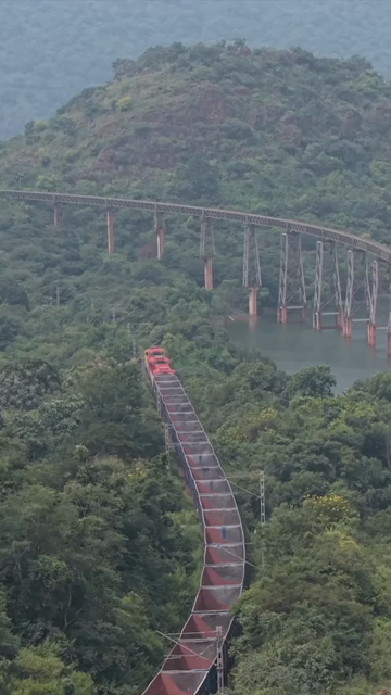 Vertical Aerial View of Railway Bridge with Train in Sandur Karnataka India