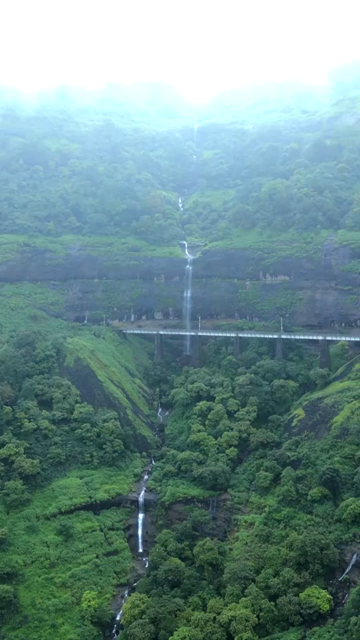 Vertical Aerial View of Railway Viaduct and Waterfall in Lonavala Maharashtra