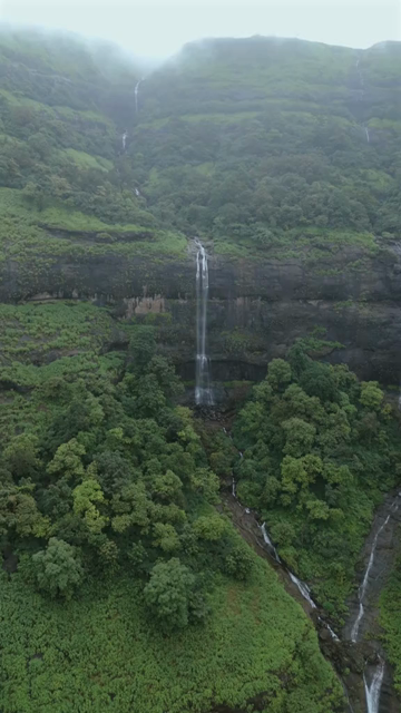 Vertical Aerial View of Railway Viaduct and Waterfall in Lonavala Maharashtra