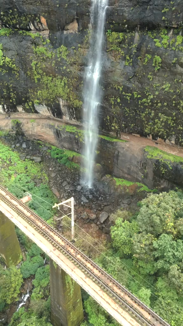 Vertical Aerial View of Railway Viaduct and Waterfall in Lonavala Maharashtra
