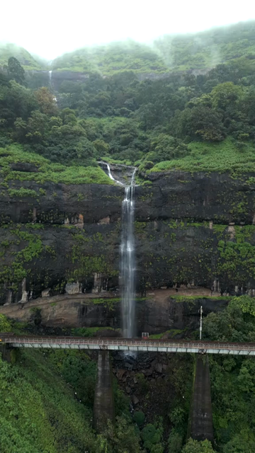 Vertical Aerial View of Railway Viaduct and Waterfall in Lonavala Maharashtra