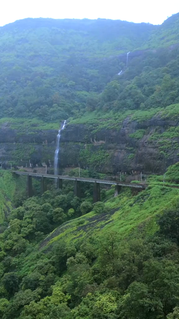 Vertical Aerial View of Railway Viaduct and Waterfall in Lonavala Maharashtra