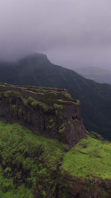 Vertical Aerial View of Rajgad Fort and Lush Sahyadri Mountains Maharashtra