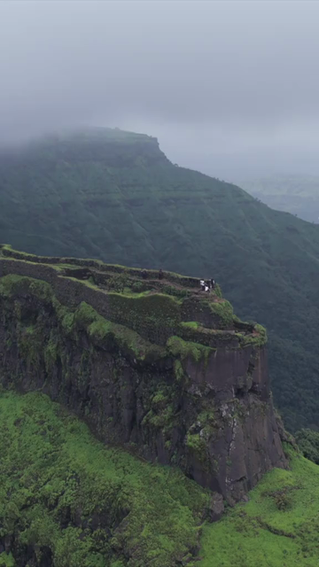 Vertical Aerial View of Rajgad Fort and Lush Sahyadri Mountains Maharashtra
