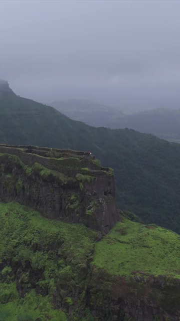 Vertical Aerial View of Rajgad Fort and Lush Sahyadri Mountains Maharashtra