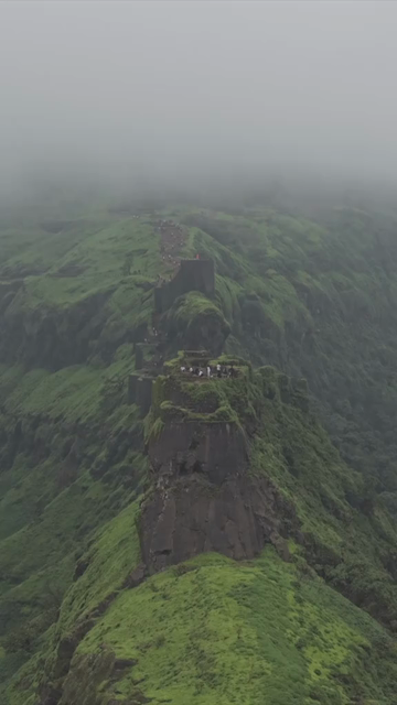 Vertical Aerial View of Rajgad Fort and Lush Sahyadri Mountains Maharashtra