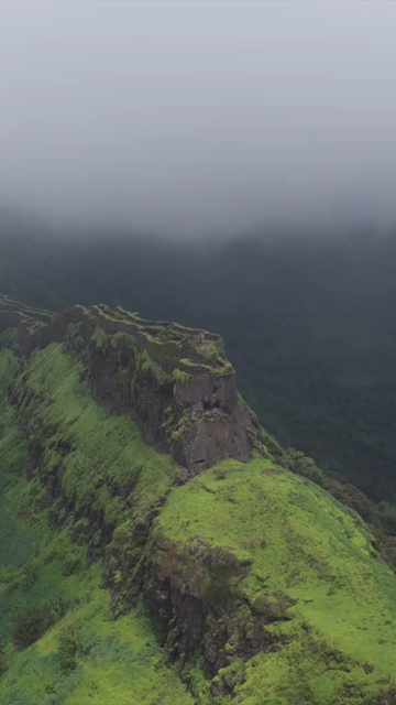 Vertical Aerial View of Rajgad Fort and Lush Sahyadri Mountains Maharashtra