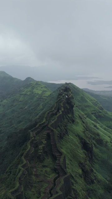 Vertical Aerial View of Rajgad Fort and Lush Sahyadri Mountains Maharashtra