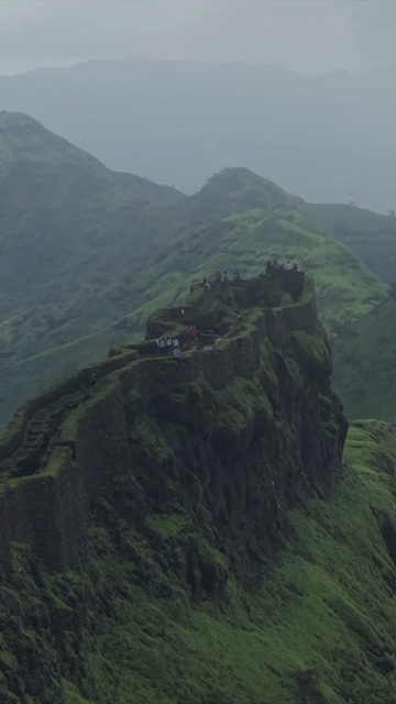 Vertical Aerial View of Rajgad Fort and Lush Sahyadri Mountains Maharashtra