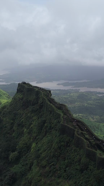 Vertical Aerial View of Rajgad Fort and Lush Sahyadri Mountains Maharashtra