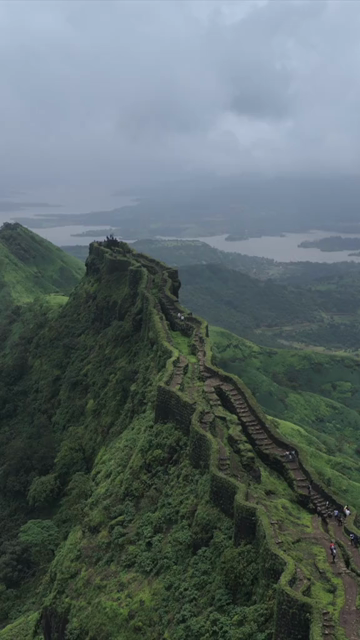 Vertical Aerial View of Rajgad Fort and Lush Sahyadri Mountains Maharashtra