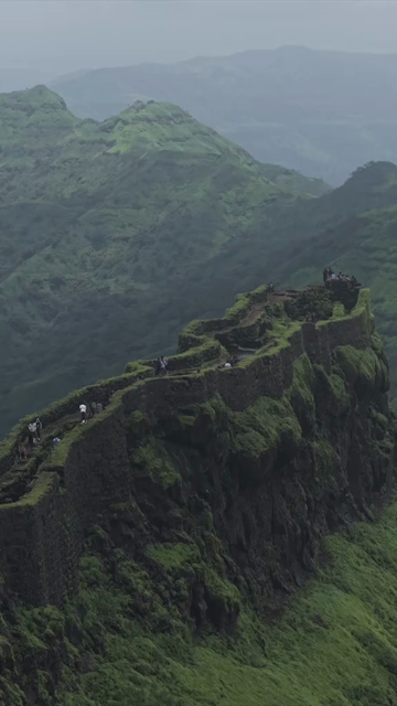 Vertical Aerial View of Rajgad Fort and Lush Sahyadri Mountains Maharashtra