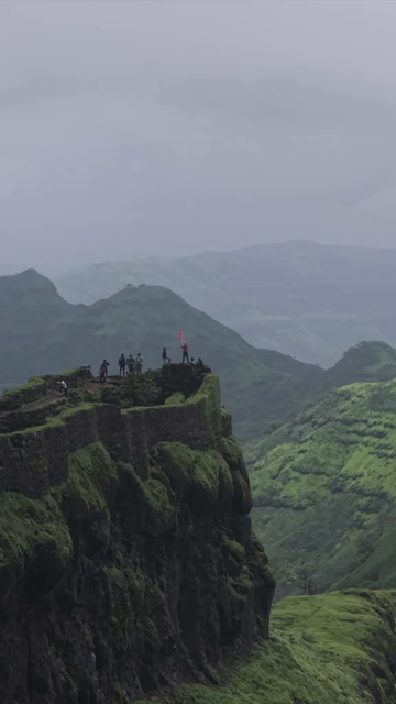 Vertical Aerial View of Rajgad Fort and Lush Sahyadri Mountains Maharashtra