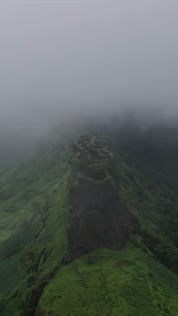 Vertical Aerial View of Rajgad Fort and Lush Sahyadri Mountains Maharashtra