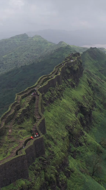 Vertical Aerial View of Rajgad Fort and Lush Sahyadri Mountains Maharashtra