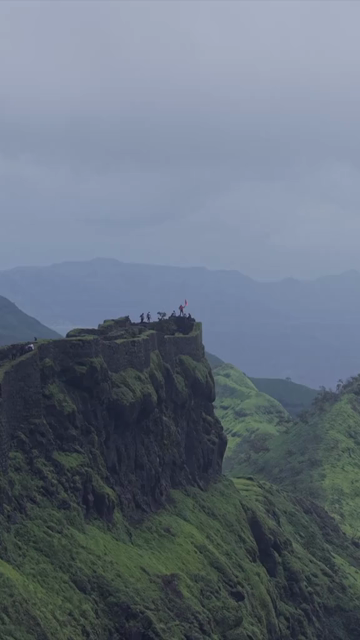 Vertical Aerial View of Rajgad Fort and Lush Sahyadri Mountains Maharashtra