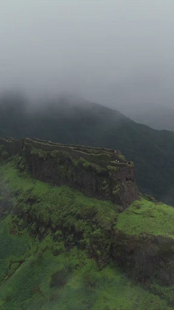 Vertical Aerial View of Rajgad Fort and Lush Sahyadri Mountains Maharashtra