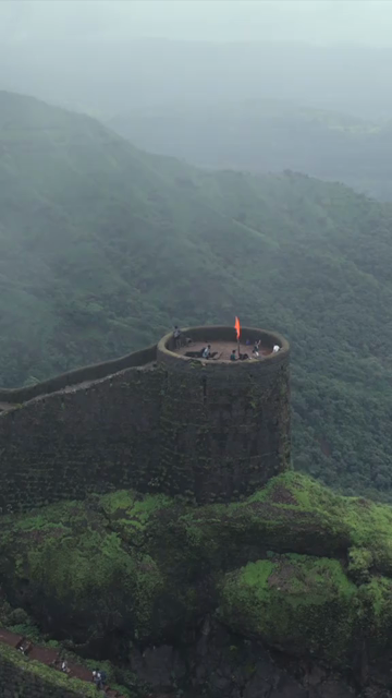 Vertical Aerial View of Rajgad Fort and Lush Sahyadri Mountains Maharashtra