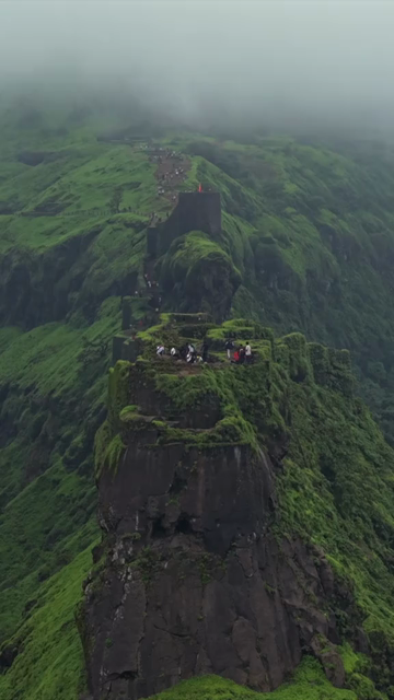 Vertical Aerial View of Rajgad Fort and Lush Sahyadri Mountains Maharashtra