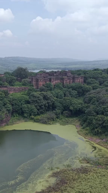 Vertical Aerial View of Ranthambore Fort and Lush Landscape Rajasthan