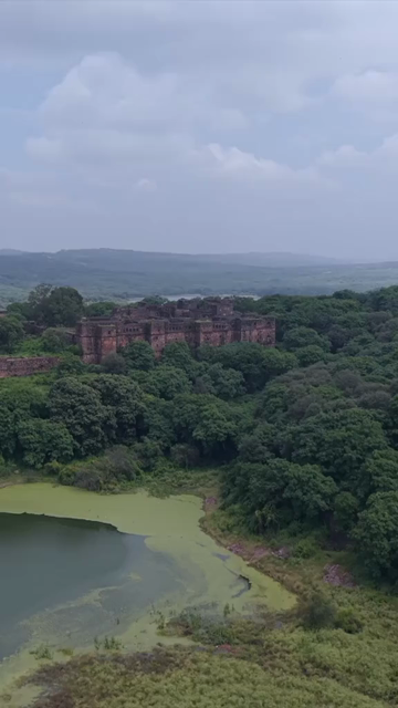 Vertical Aerial View of Ranthambore Fort and Lush Landscape Rajasthan