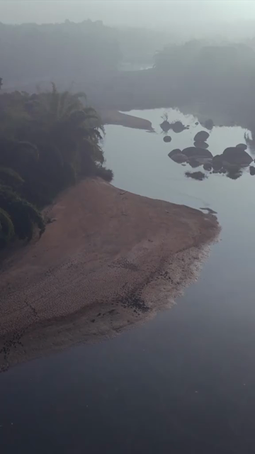 Vertical Aerial View of River and Forested Hills Near Pune Maharashtra