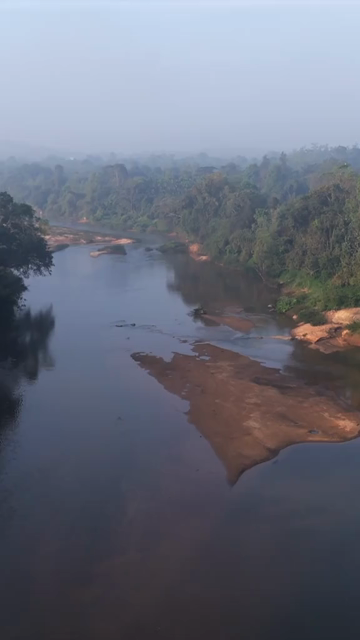 Vertical Aerial View of River and Forested Hills Near Pune Maharashtra