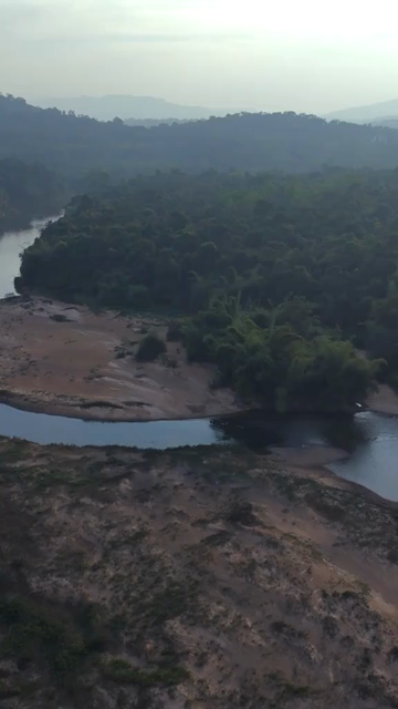 Vertical Aerial View of River and Forested Hills Near Pune Maharashtra