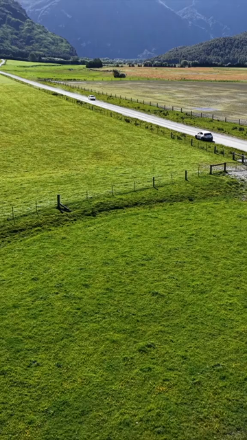 Vertical Aerial View of Road Leading to Rob Roy Glacier in New Zealand
