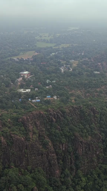 Vertical Aerial View of Rocky Hills and Misty Satpura Landscape Pachmarhi Madhya Pradesh