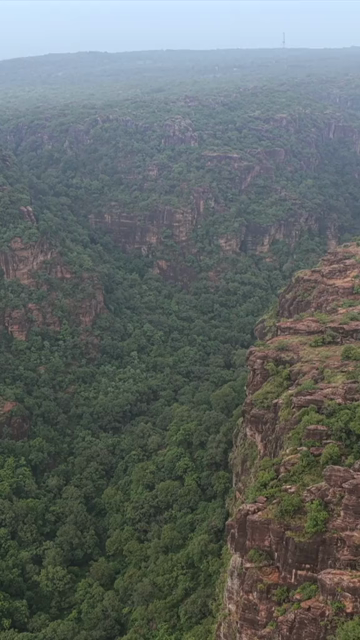 Vertical Aerial View of Rocky Hills and Misty Satpura Landscape Pachmarhi Madhya Pradesh