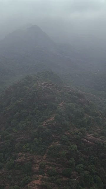 Vertical Aerial View of Rocky Hills and Misty Satpura Landscape Pachmarhi Madhya Pradesh