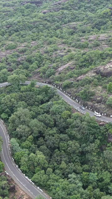 Vertical Aerial View of Rocky Hills and Misty Satpura Landscape Pachmarhi Madhya Pradesh