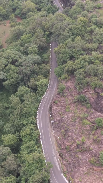 Vertical Aerial View of Rocky Hills and Misty Satpura Landscape Pachmarhi Madhya Pradesh