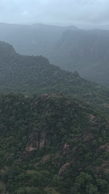 Vertical Aerial View of Rocky Hills and Misty Satpura Landscape Pachmarhi Madhya Pradesh