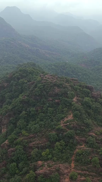 Vertical Aerial View of Rocky Hills and Misty Satpura Landscape Pachmarhi Madhya Pradesh