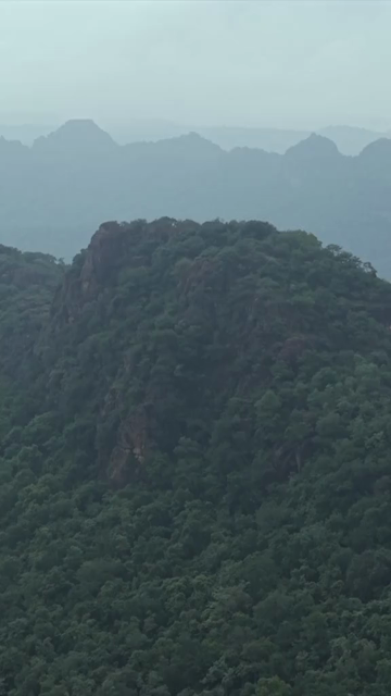 Vertical Aerial View of Rocky Hills and Misty Satpura Landscape Pachmarhi Madhya Pradesh